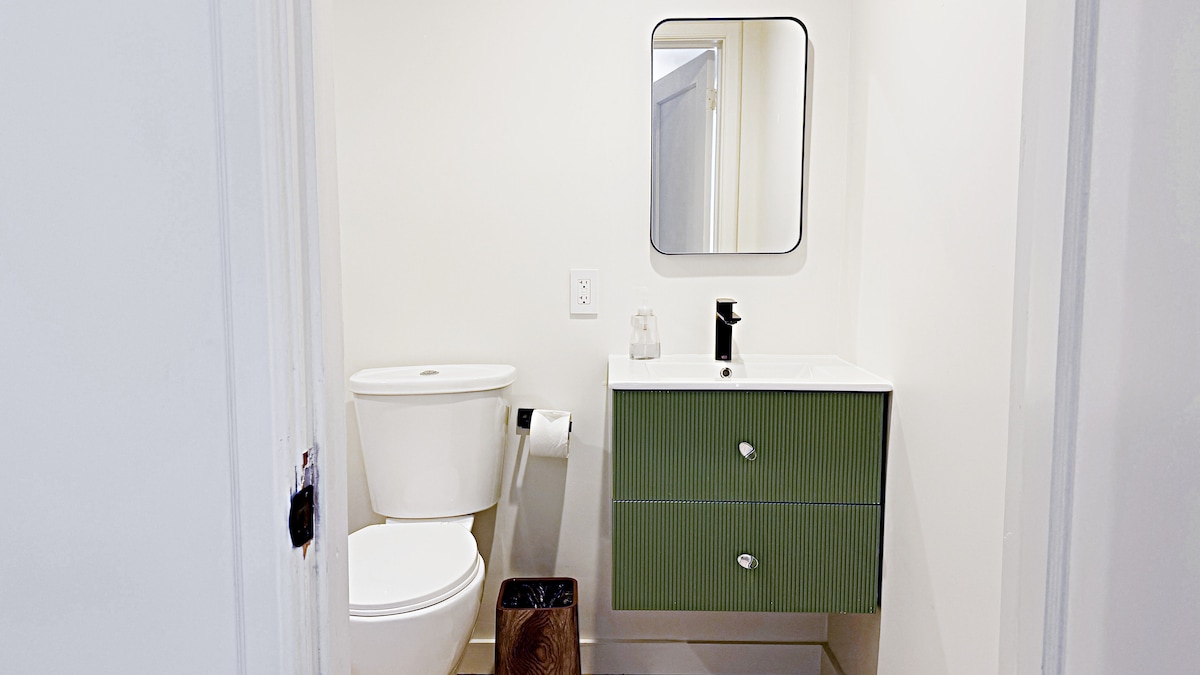 Olive fluted vanity in the suite bathroom