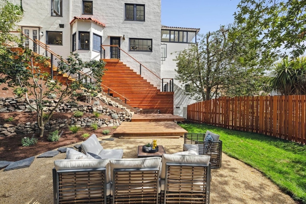 Shared backyard patio and wood stairs